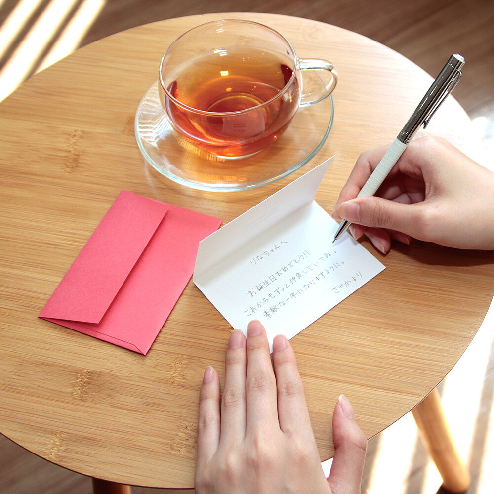 Writing a message inside the Labclip Mizuhiki Mini Greeting Card