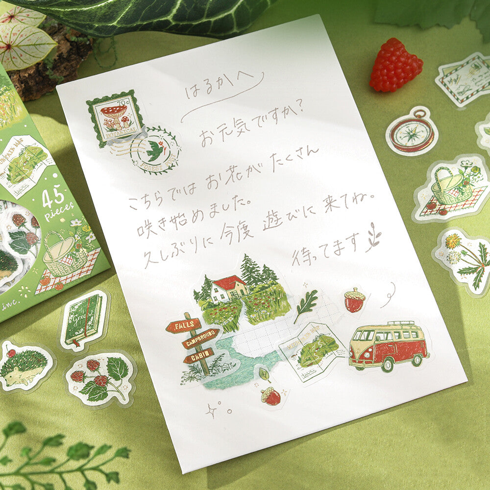 BGM To the Forest flake stickers used on a handwritten journal page with forest and travel illustrations