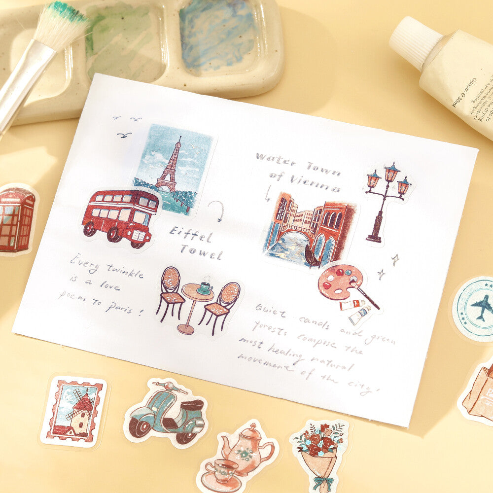 BGM To the World flake stickers used on a handwritten travel journal page with European city illustrations
