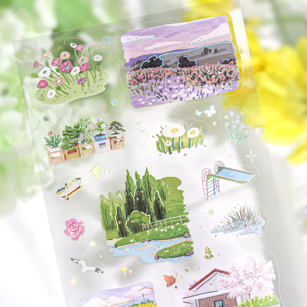 Close-up of BGM IRIDE Series 4 On a Trip clear stickers with aurora foil