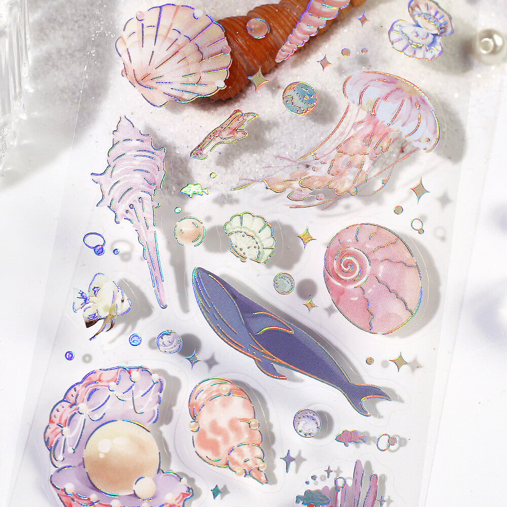 Close-up of BGM IRIDE Vol.2 Ocean clear stickers with aurora foil