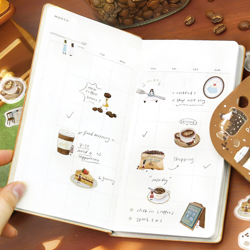 BGM Petit Story Cafe flake stickers decorating a monthly planner spread