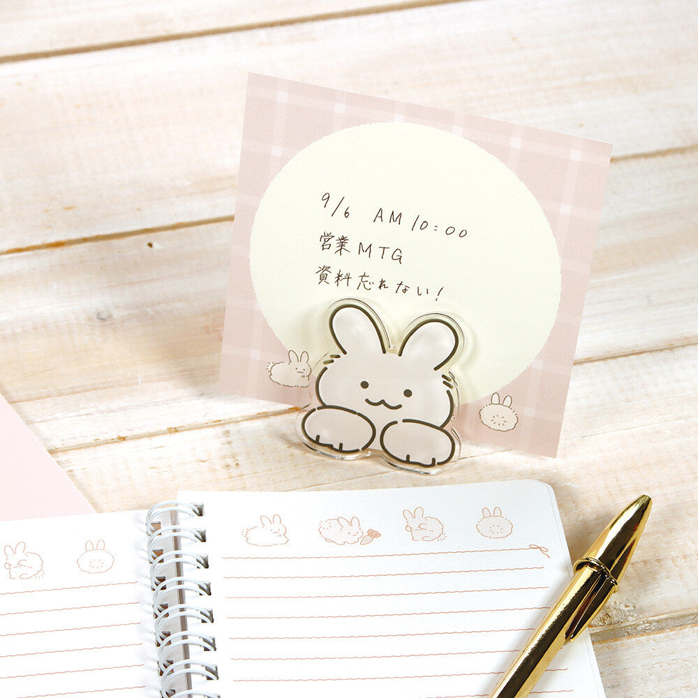 Labclip Marumaru Animal Acrylic Clip Cat holding a memo upright beside a notebook