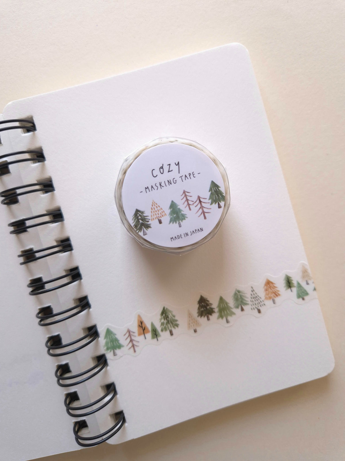 Mind Wave COZY Die-Cut Masking Tape – Forest shown on a notebook with tree border and product label