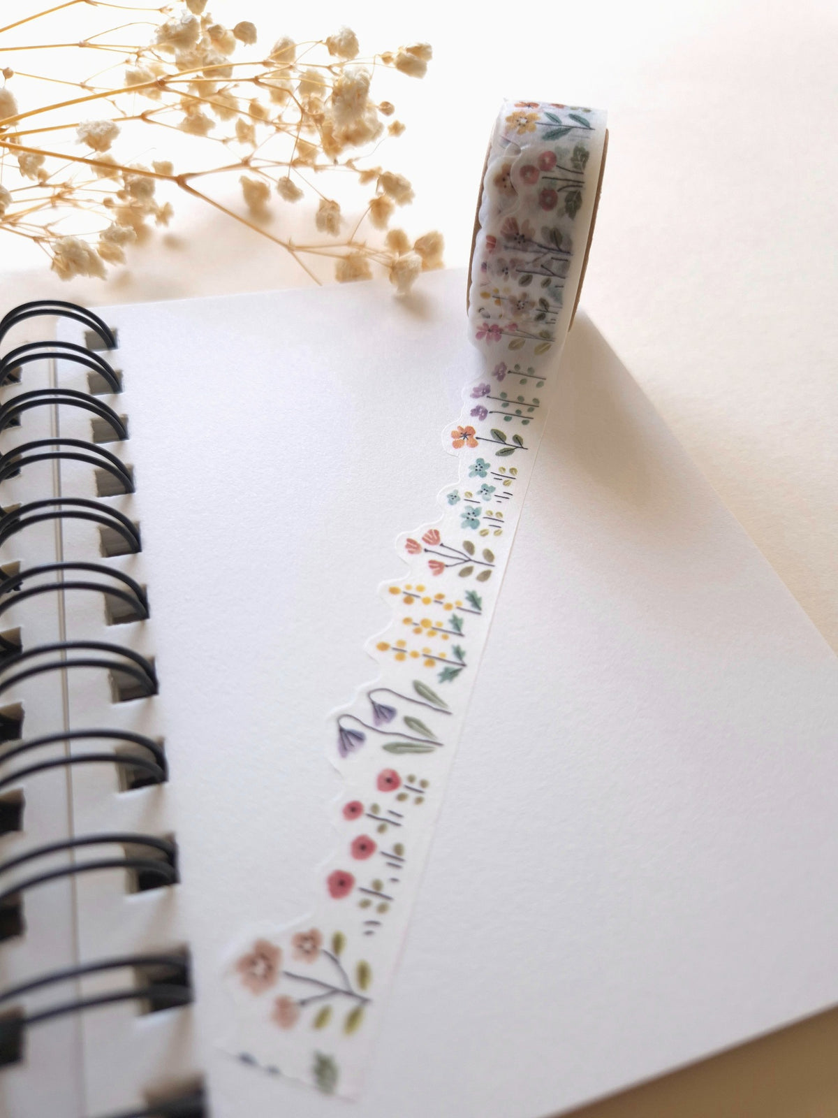 Mind Wave COZY Flower die-cut masking tape unrolled across notebook page