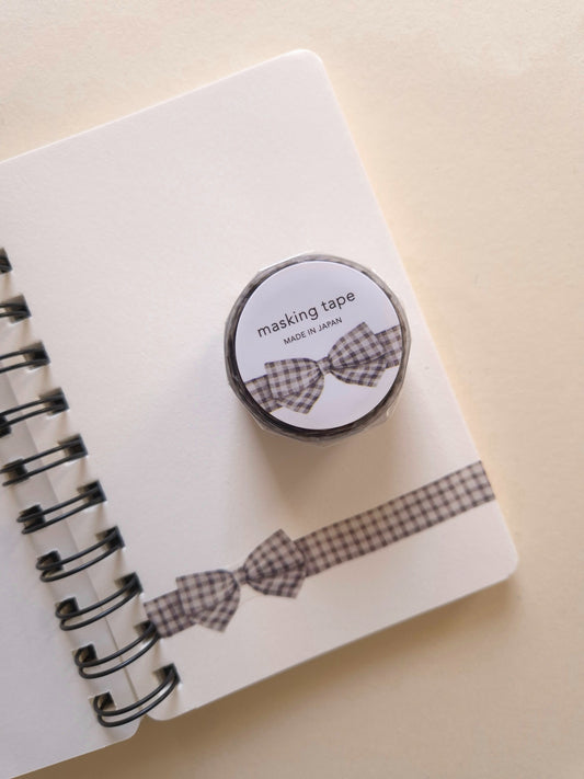 Mind Wave Ribbon Die-Cut Masking Tape Gingham Check Gray with bow design applied to notebook