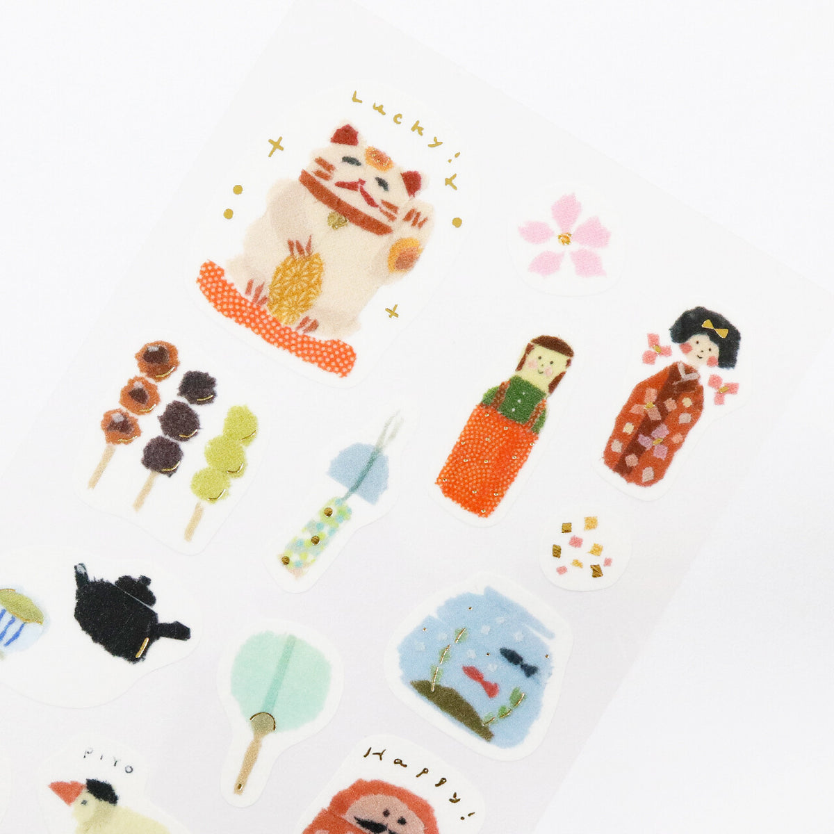 Close-up of SAIEN × Miki Tamura Japon Masking Stickers showing maneki-neko, daruma and other Japanese motifs