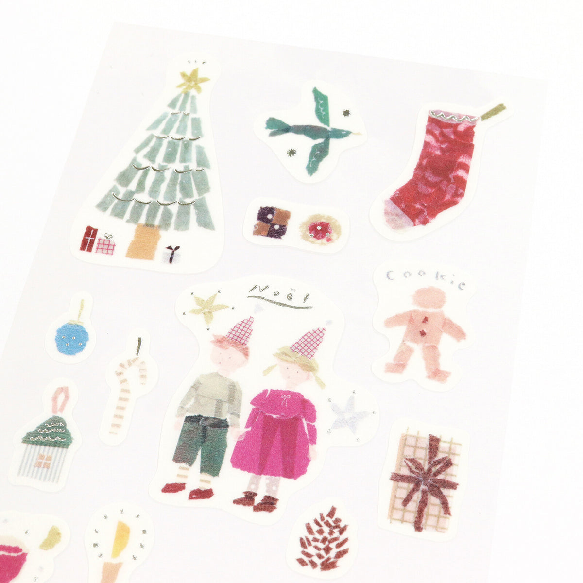 Close-up of SAIEN × Miki Tamura Winter Masking Stickers showing Christmas tree, stocking, gifts and winter motifs