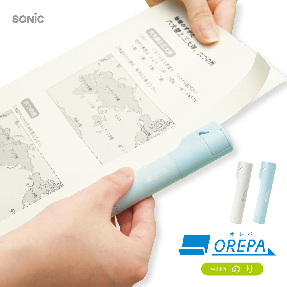 Sonic OREPA Print Cutter + Glue Stick trimming a printed sheet