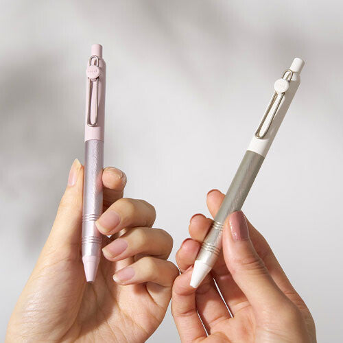 Uni-ball ZENTO Flow Gel Pen – Birch White and Anthurium Pink in hand