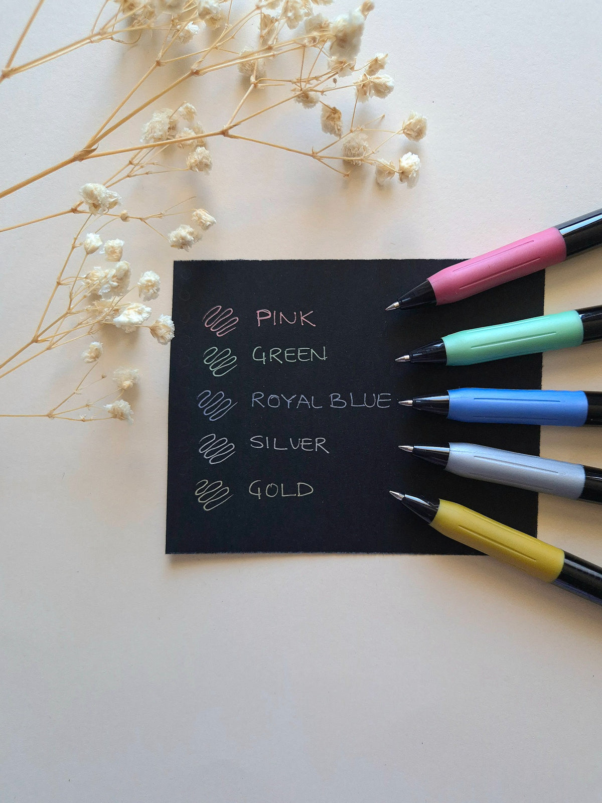Zebra Sarasa Clip 0.5 Deco Shine – writing sample on black paper